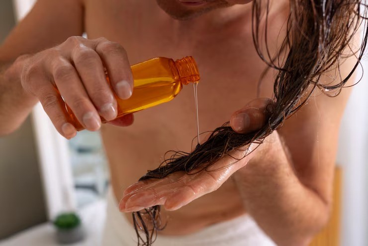 minyak kemiri, rambut rontok pasca melahirkan, kemiri untuk rambut, manfaat kemiri, perawatan rambut alami ibu muda, herbal rambut rontok, solusi rambut sehat alami